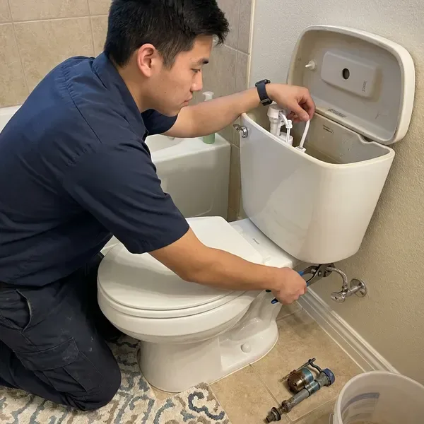 HGR Plumbing technician providing toilet repair in Atlanta, GA